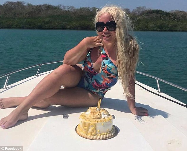 Peralta is seen earlier this year on her 43rd birthday on a tropical vacation in Columbia
