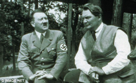 Patron: Hermann Goering, pictured right with Hitler, was a regular at French brothels