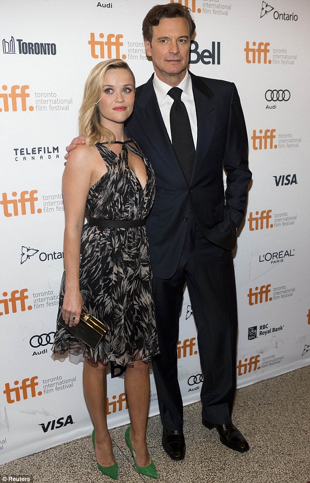 Say cheese: Reese was joined on the carpet by her co-star Colin Firth