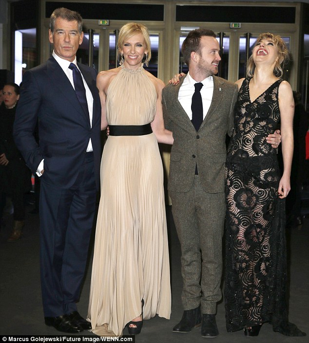 Still laughing: Imogen and Aaron were joined by co-stars Pierce Brosnan and Toni Collette