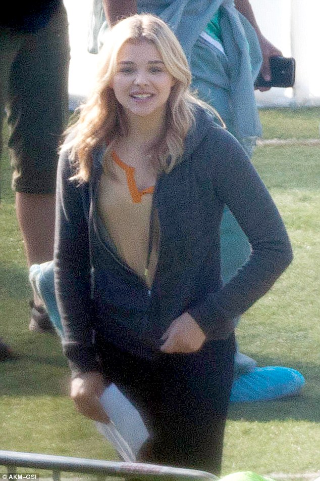 Smiles: The mood was decidedly lighter when Moretz wasn