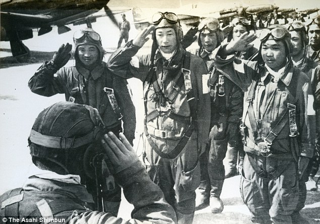 Pilots salute their captain before leavint Chiran Air Base in 1954 to embark on a kamikaze attack. The museum has now sparked outrage in China for asking for pilots