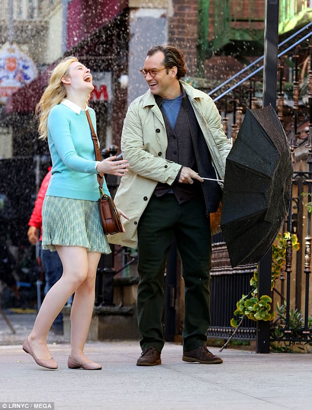 On set: Elle Fanning and Jude Law were spotted filming for the untitled new Woody Allen comedy in New York City on Thursday