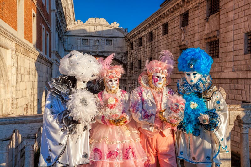 Carnival masks against Bridge of Sighs in Venice, Italy. Carnival masks against famous Bridge of Sighs in Venice, Italy royalty free stock photo