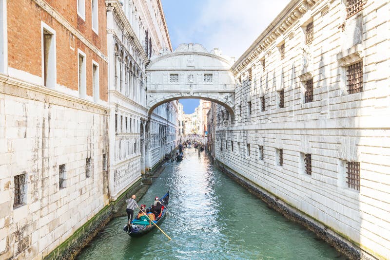 Gondolas is passing over Bridge of Sighs in Venice, Italy.  royalty free stock photos