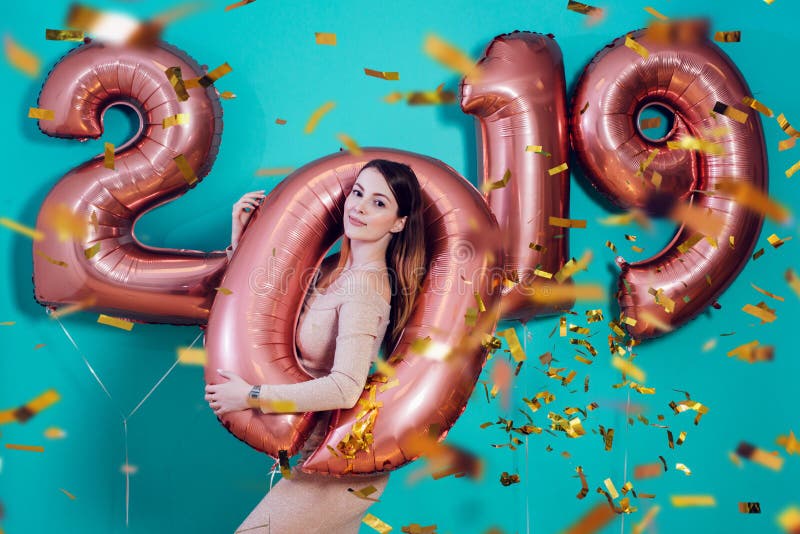 Happy new year and Merry Christmas Beautiful young woman with balloons 2019. Happy new year and Merry Christmas Beautiful young women with balloons 2019 royalty free stock image