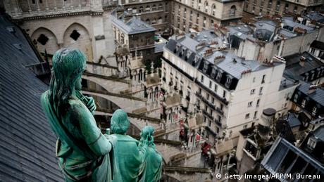 Statues on the roof of Notre Dame Cathedral in Paris (Getty Images/AFP/M. Bureau)